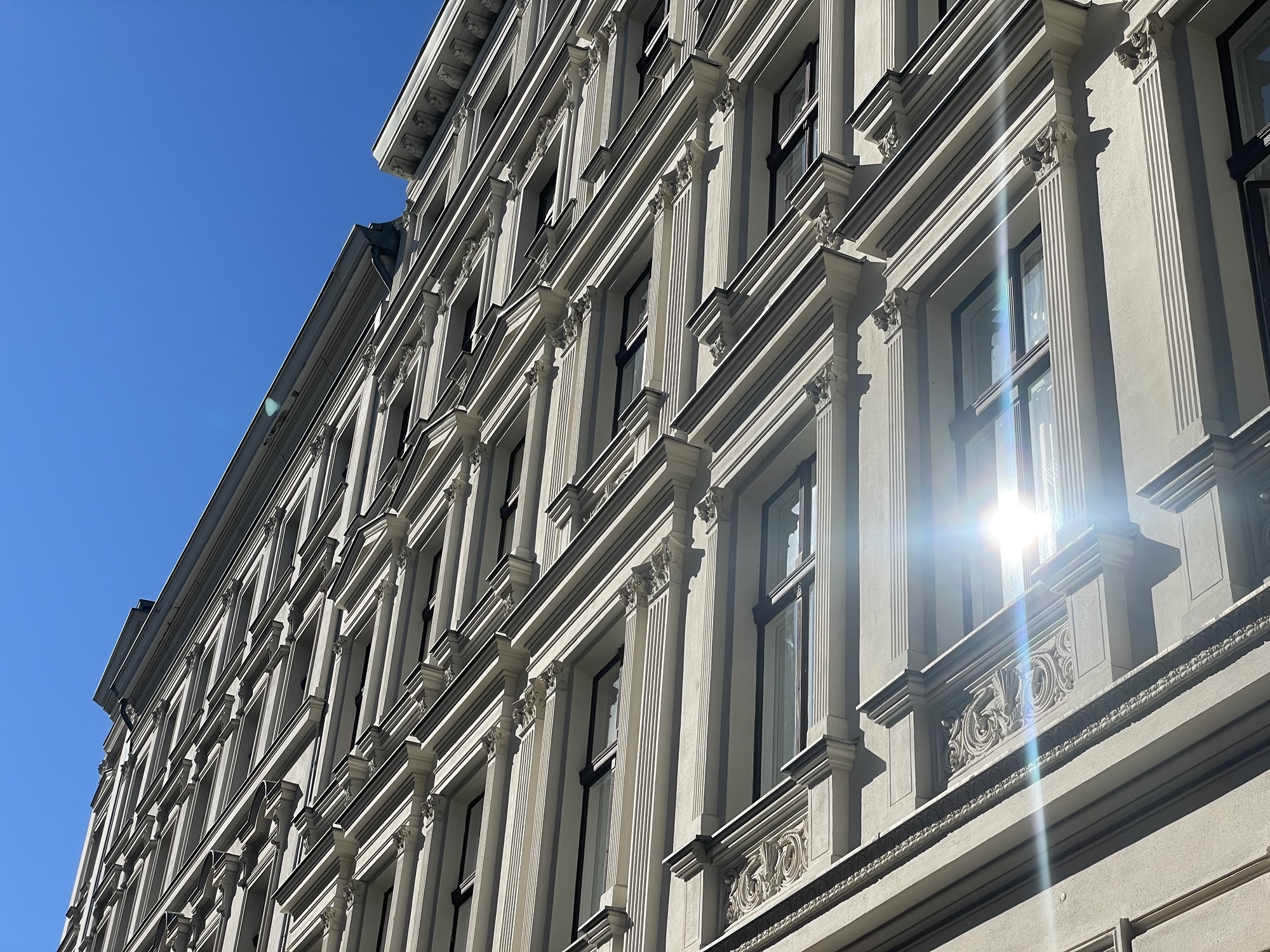 Spring light falling across old apartment buildings near Reuterkiez